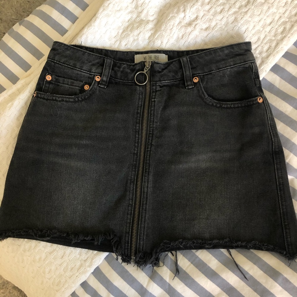 Black denim skirt.